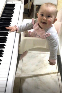 Mariah at 8 months. The chair with the tray removed worked best.